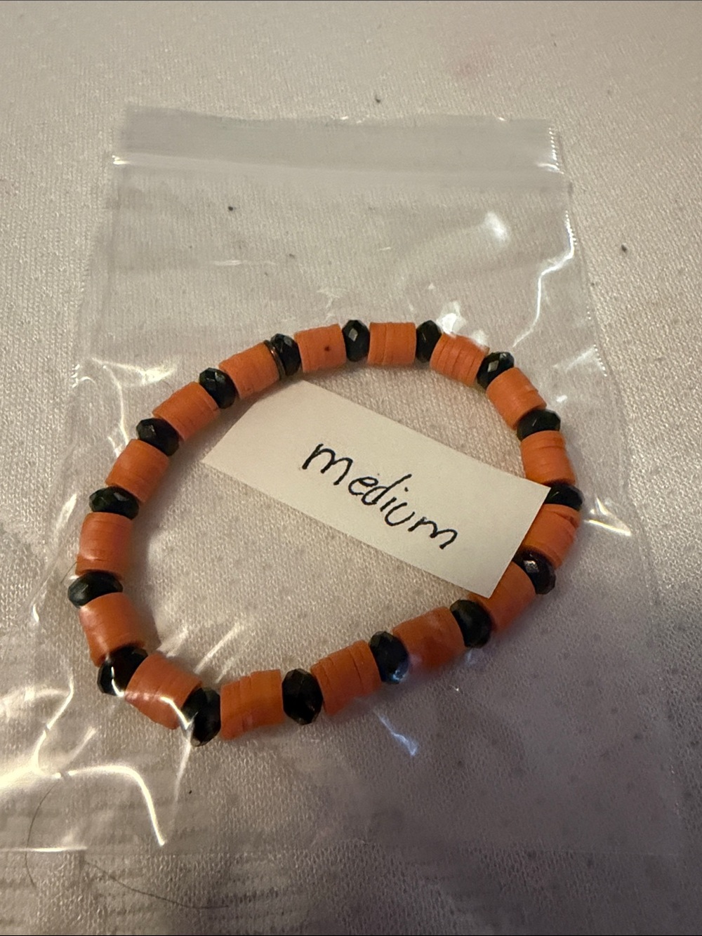 Handmade Orange and Black Beaded Stretch Bracelet